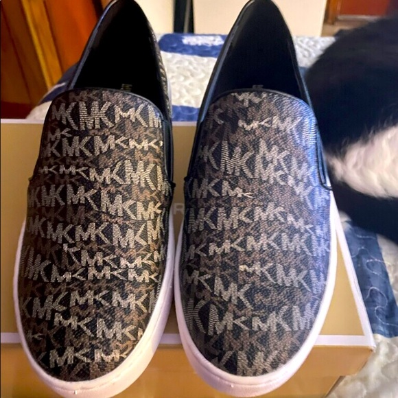 Michael Kors slip on boat shoes. - Picture 1 of 1